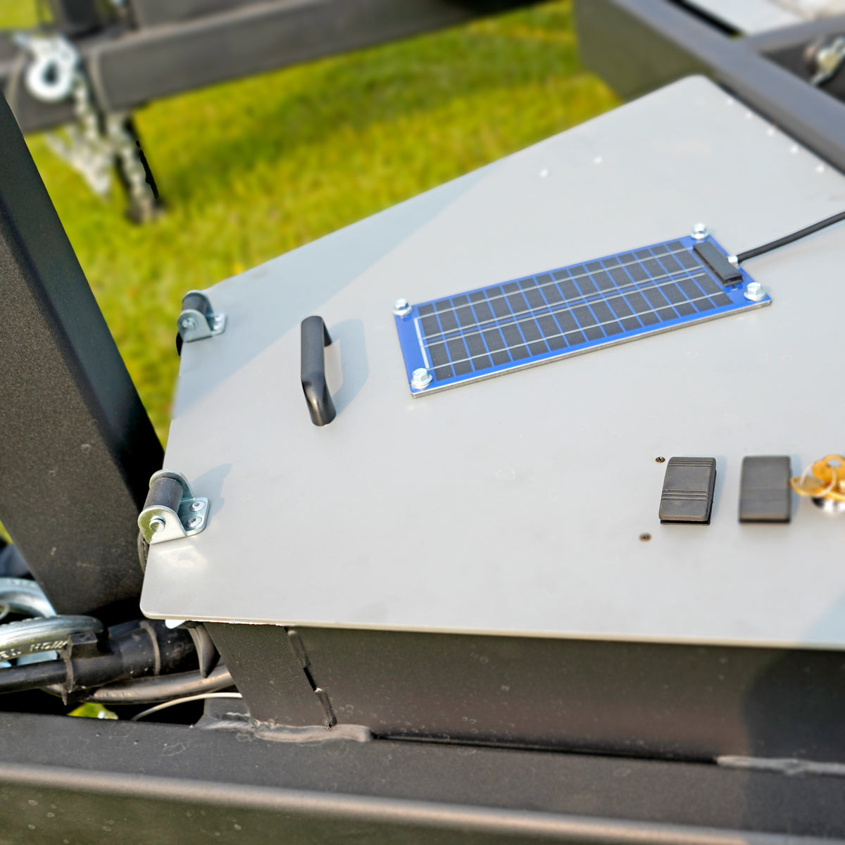 PulseTech solar charger on the battery box